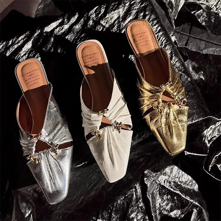 Genuine leather women's square toe slippers in beige, low heel, shown from side.
