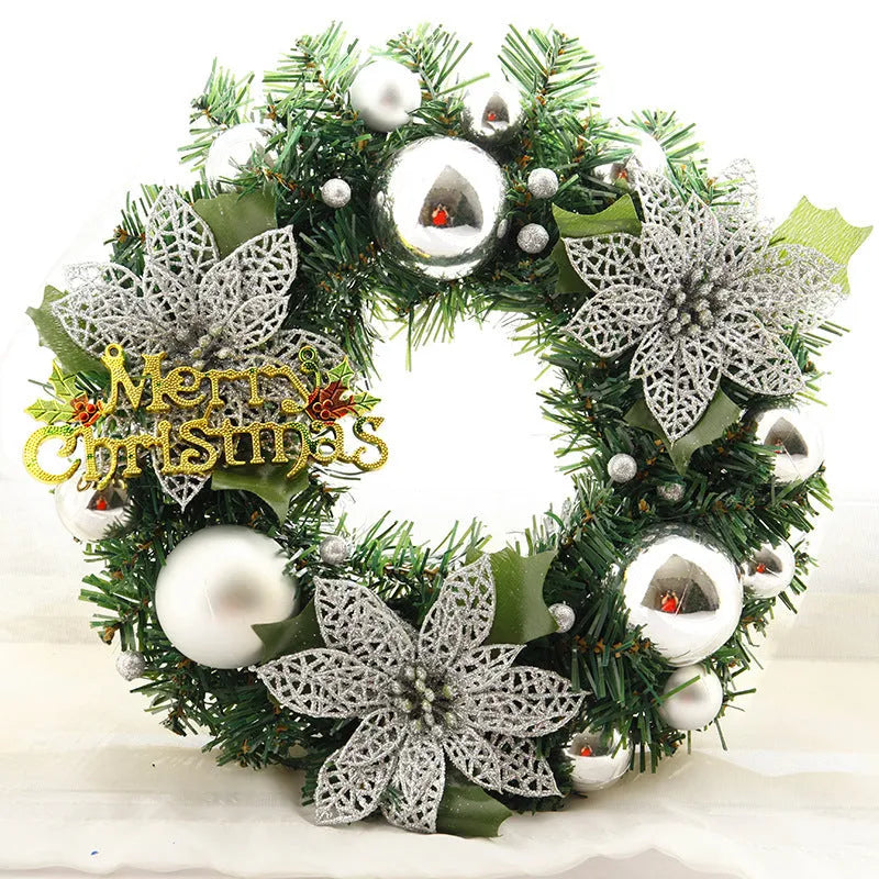 30cm circular plastic Christmas wreath with festive foliage in a choice of seven colours.