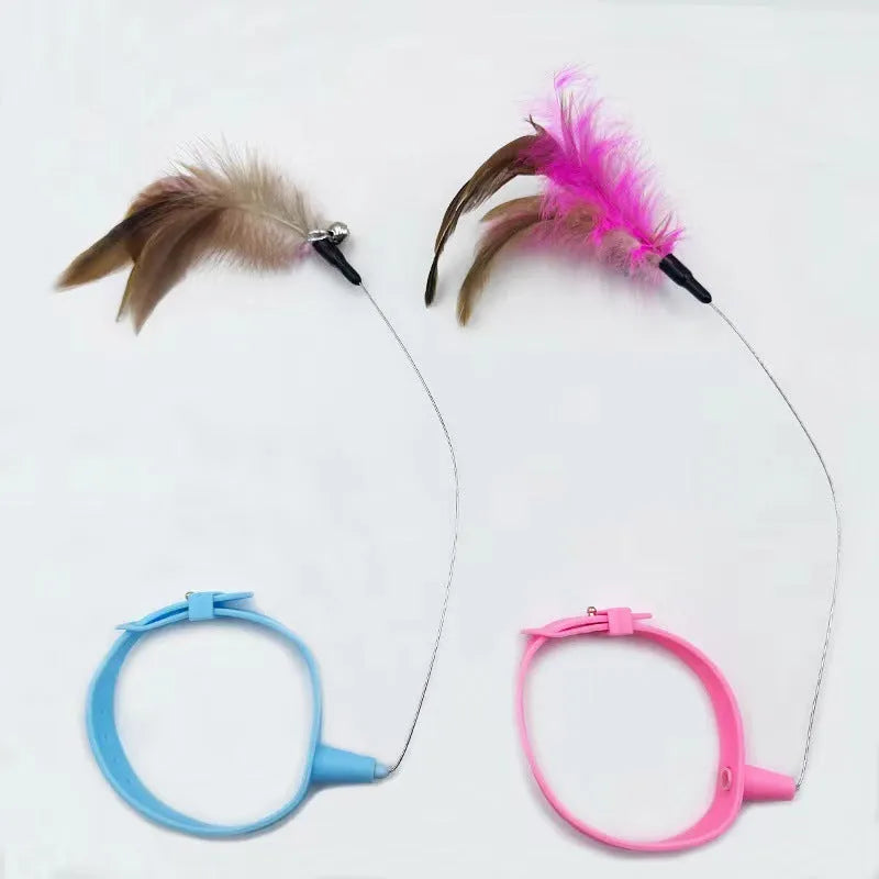 Blue adjustable cat collar with attached silicone teasing wand, feather, and bell for interactive play.
