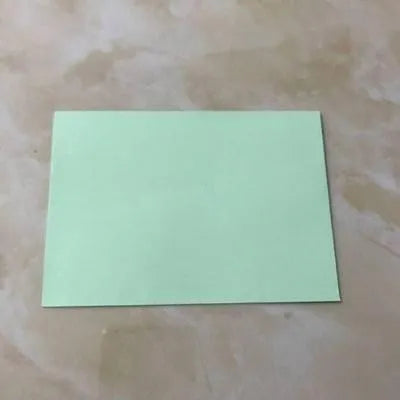 Mini coloured non-printed envelopes in various colours showing 11.5x8cm size for business cards