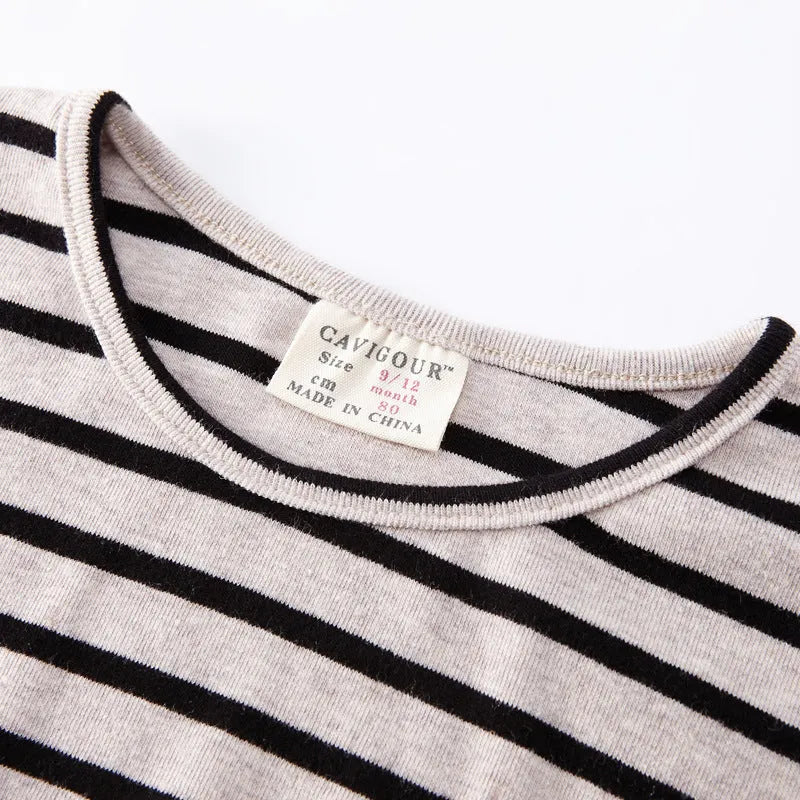 Red and white striped long sleeve cotton t-shirt for a baby girl on a hanger