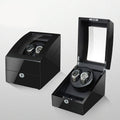 Black mechanical watch winder with piano paint finish, multiple rotation modes, and EU/US plug option.