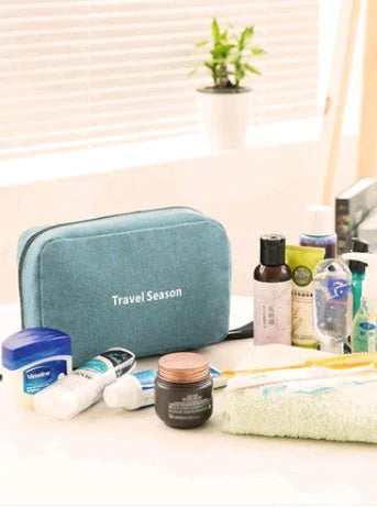 Versatile Travel Organizer: Multifunctional makeup bag with hanging hook, multiple pockets, and foldable design for compact storage