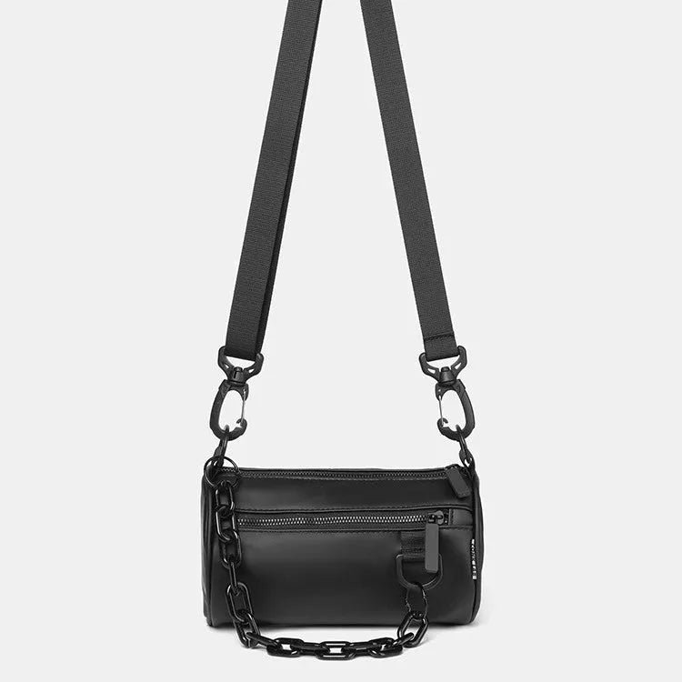 Black casual Oxford cloth messenger bag with a chain strap, shown closed.