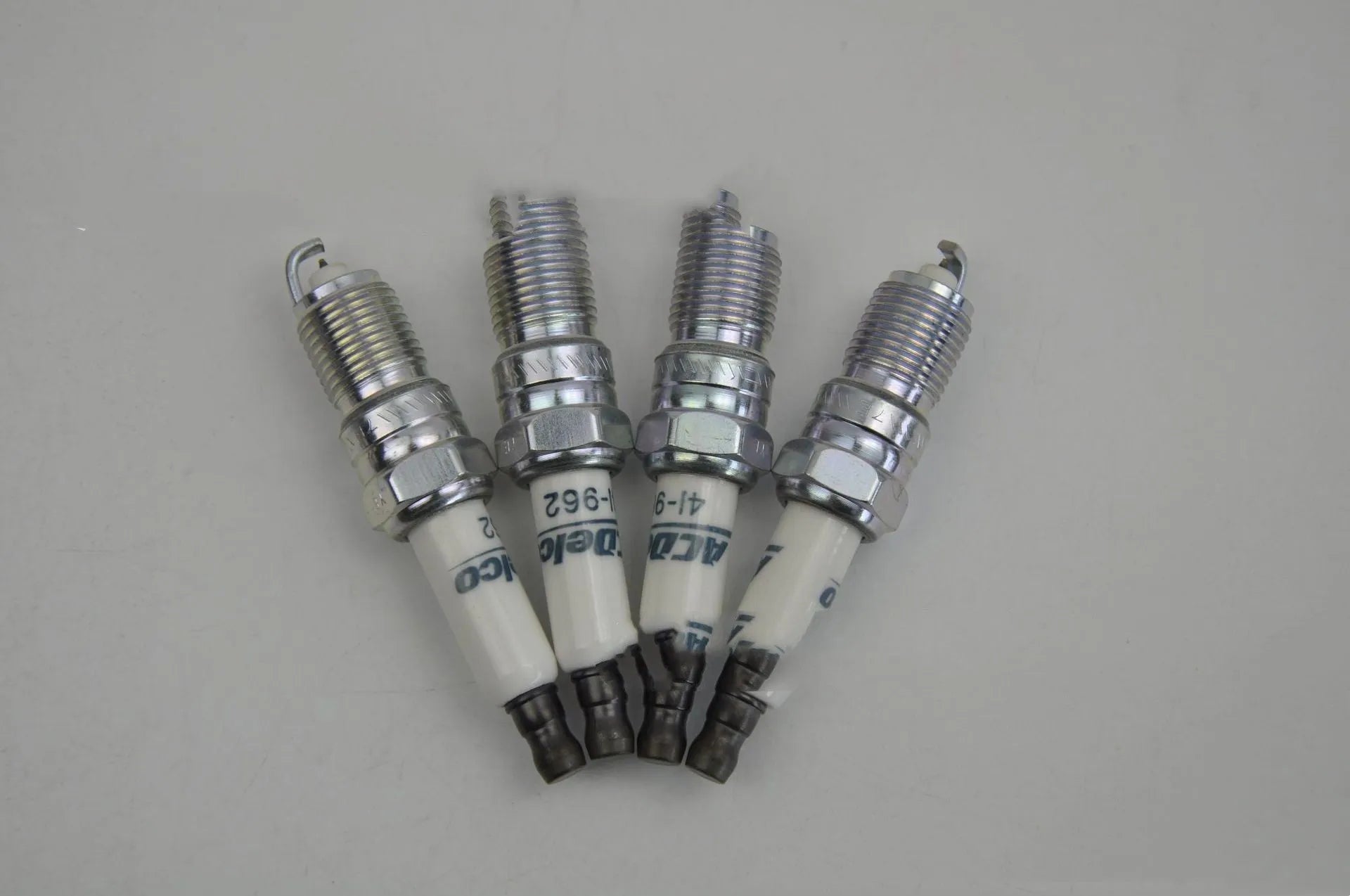 Iridium gold spark plug 41-962 with iridium gold flame electrode for Buick Chevrolet Hummer