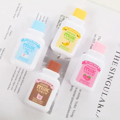 Cute bottle-shaped correction tape dispenser with decorative pattern showing 6m smooth adhesive tape.