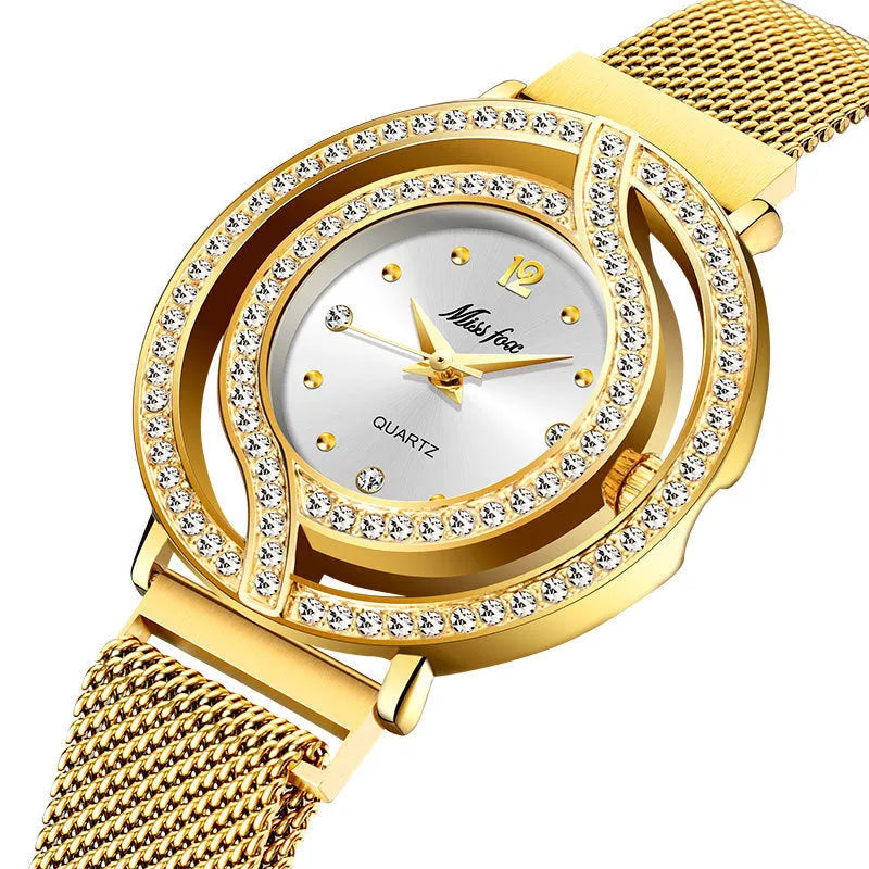 Quartz wrist watch with 32mm round alloy case, Milano mesh stainless steel strap, and magnet closure in golden blue dial option