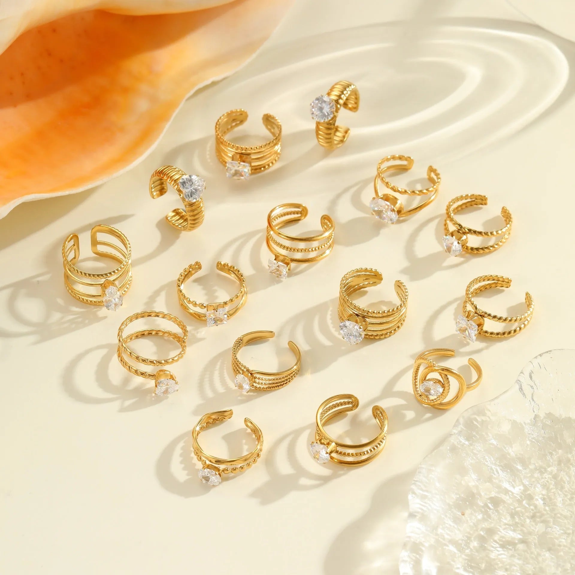 Gold electroplated geometric zircon ring with open mouth design on stainless steel