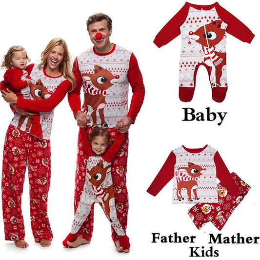 Family wearing cozy, matching holiday pajamas with a charming fox print design