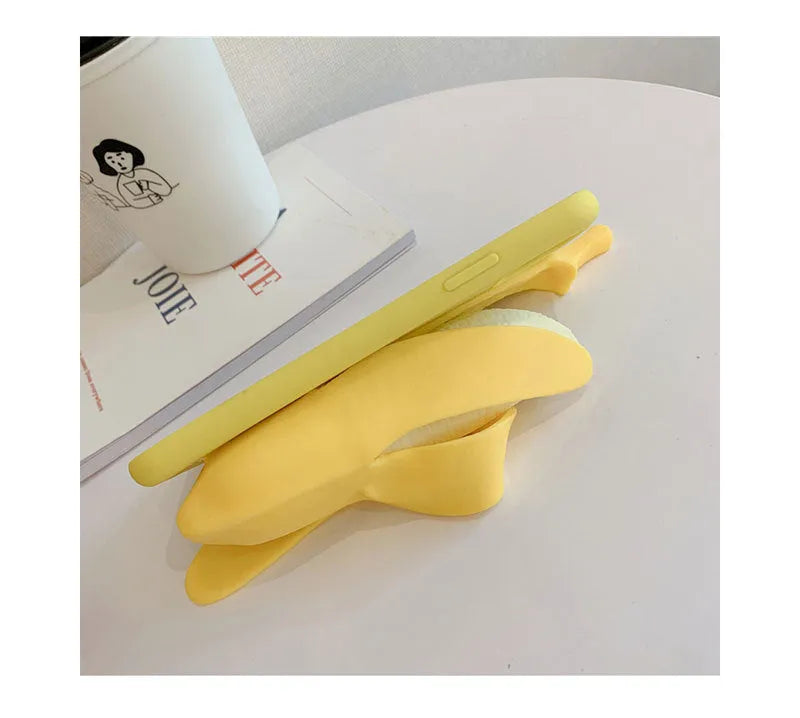 Yellow banana silicone iPhone case with unzip design showing seven protection features