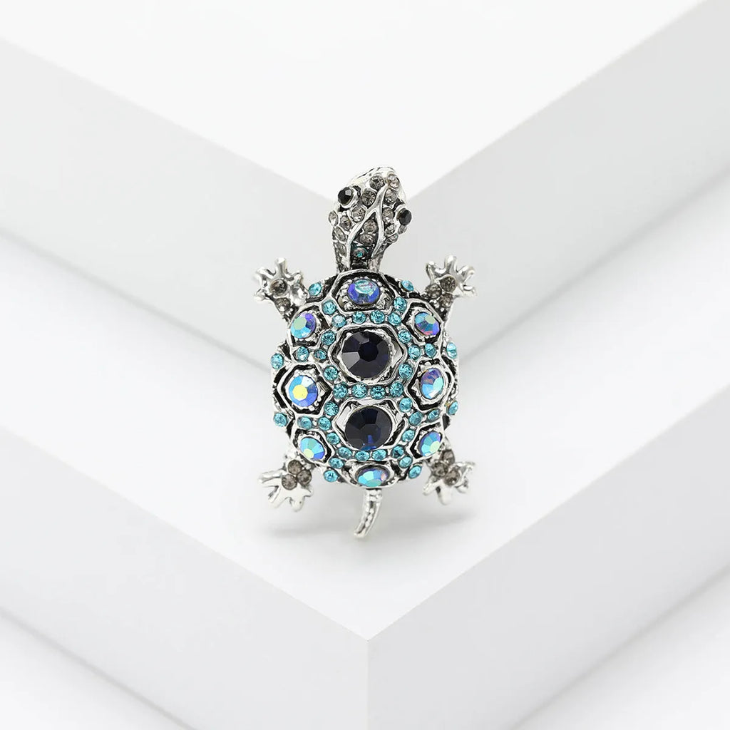 Alloy turtle brooch with rhinestone decoration in green, blue, or red colour options