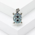 Alloy turtle brooch with rhinestone decoration in green, blue, or red colour options