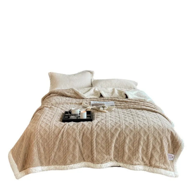 A thick taffeta thermal flannel blanket for winter, shown in one of nine colours on a bed.