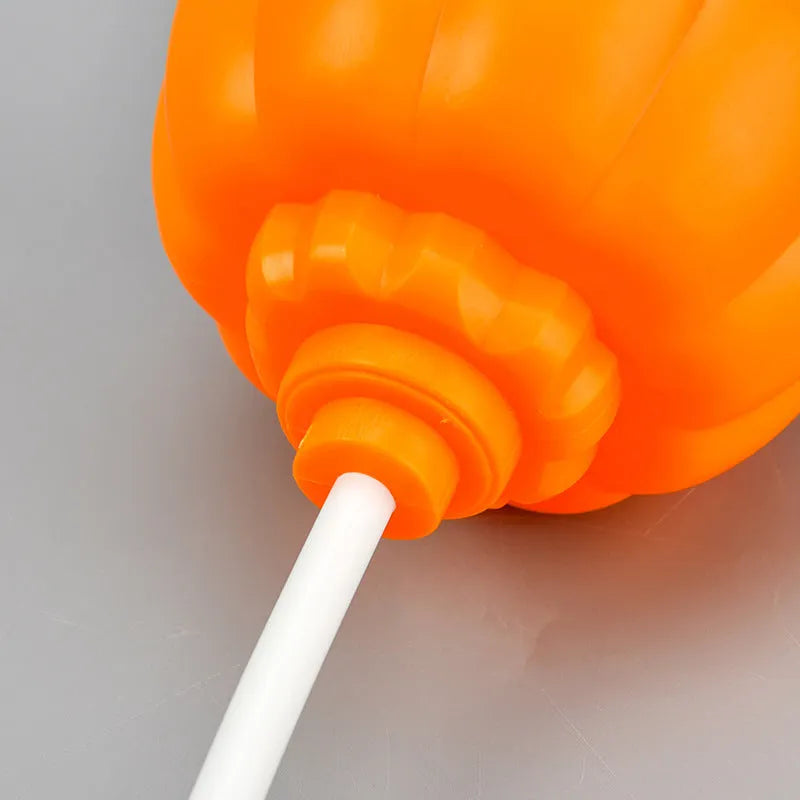 Plastic pumpkin decorative lamp with USB charging port and yellow or purple light options