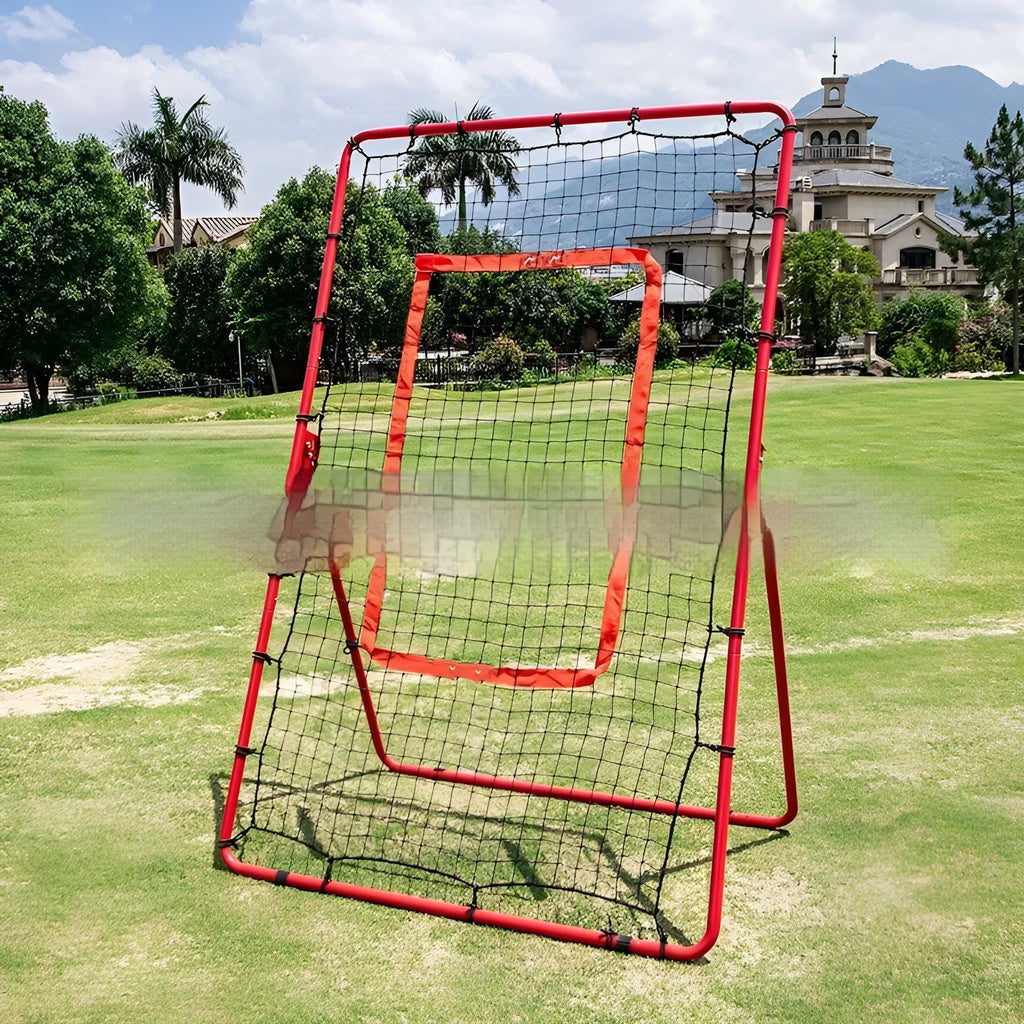 Red metal-frame portable baseball training net set up in a garden, measuring 4 feet wide by 6 feet high.