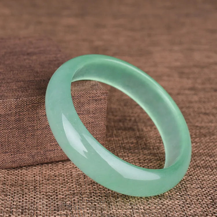 Women's oil cyan light green quartz jade bracelet showing modern simplicity design