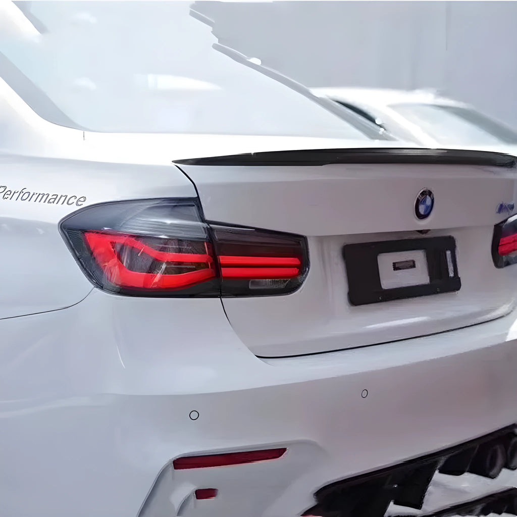 BMW 3 Series modified streamer LED tail light assembly in red or smoked black for 2012-2015 models.