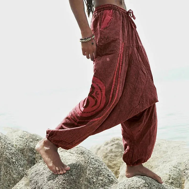 Dark green men's casual trousers with ethnic pattern and ankle-tied closure