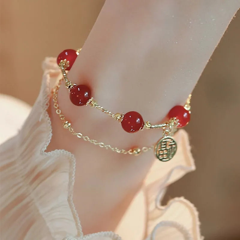 Red Agate Hongma blessing card double-layer charm bracelet for women in a gift box.
