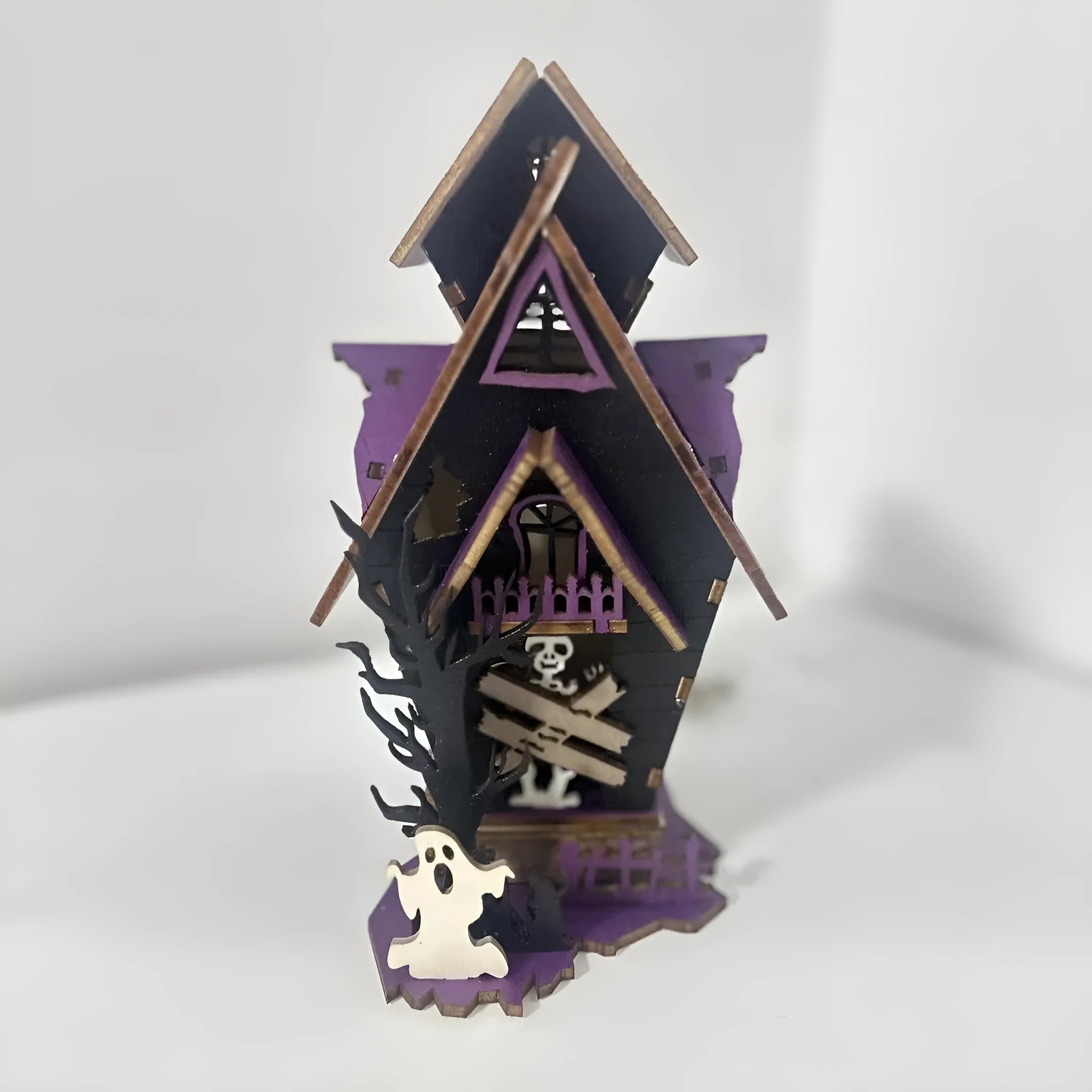 Wooden Halloween haunted house table decoration with candlestick design measuring 14x10.5x19cm