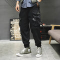 Men's cotton cargo pants in grey with multiple pockets, regular fit, side view