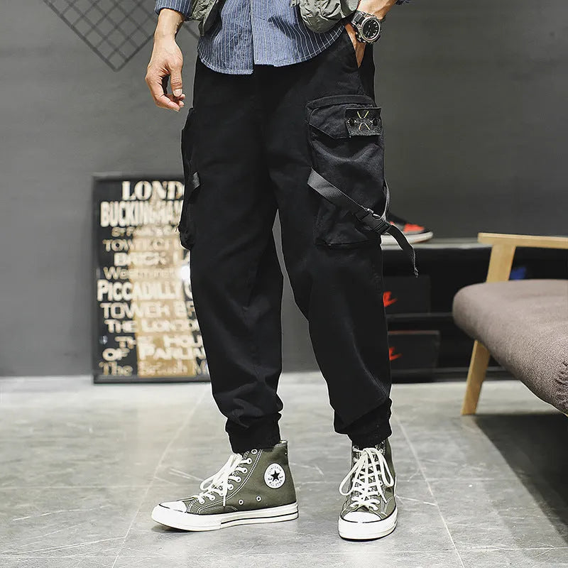 Men's cotton cargo pants in grey with multiple pockets, regular fit, side view