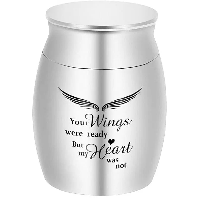 Custom stainless steel pet urn with mirror polish, precision thread seal and colour options in black, gold, photo colour or rose gold.