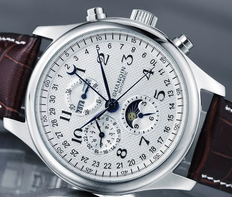 Men's mechanical wristwatch with perpetual calendar and moon phase display on a leather strap.