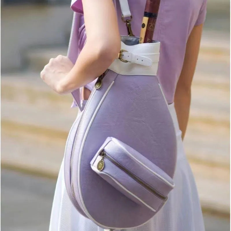 Leather one-shoulder retro badminton bag for women shown in dark brown colour.