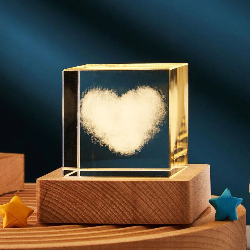 A 3D crystal cube lamp with a mesmerizing 3D pattern and warm lighting, creating a cozy and inviting atmosphere in a bedroom or home decor setting.