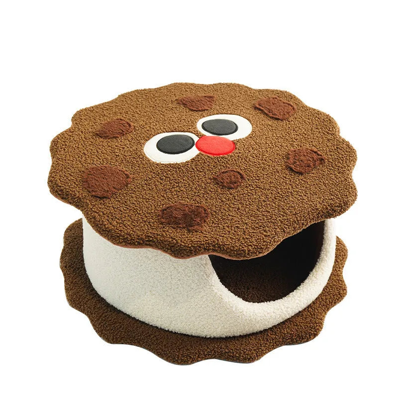 Khaki coloured nest-shaped enclosed cat house for winter sleeping.