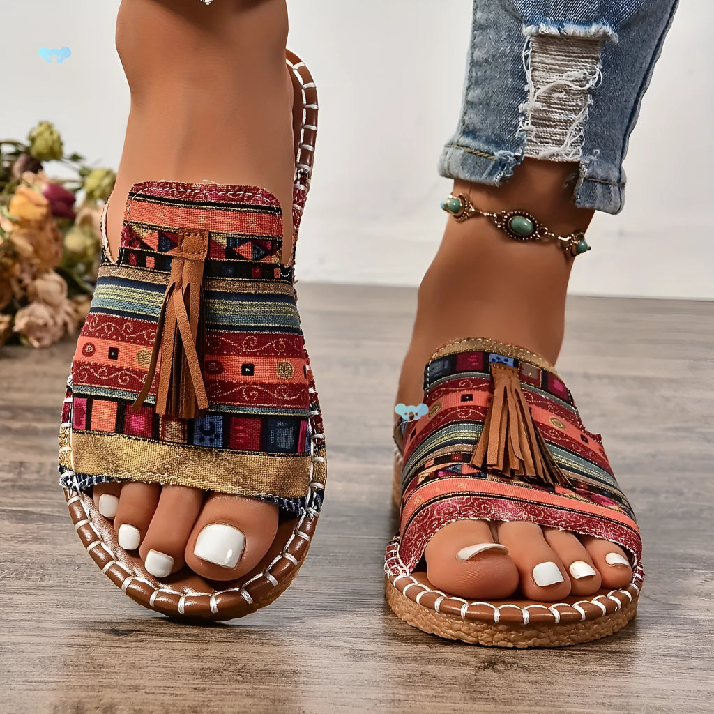 Women's tassel flat sandals in first layer cowhide with grape particle accents, Roman style, fish mouth toe, available in multiple colours