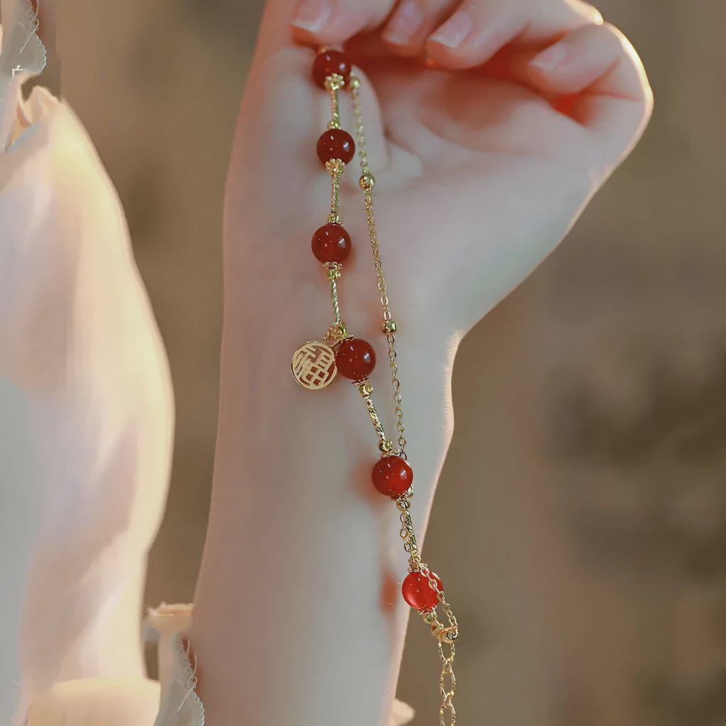Red Agate Hongma blessing card double-layer charm bracelet for women in a gift box.