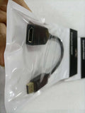 Black Display Port DP male to female extension cable with rotating connector, approximately 10cm long