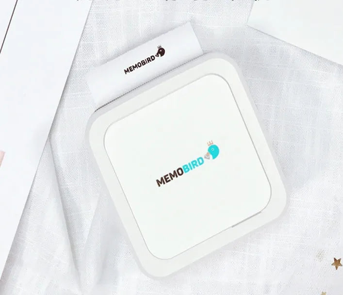 Thermal pocket portable Bluetooth printer in white, 79x79x40mm, with thermal paper roll inside