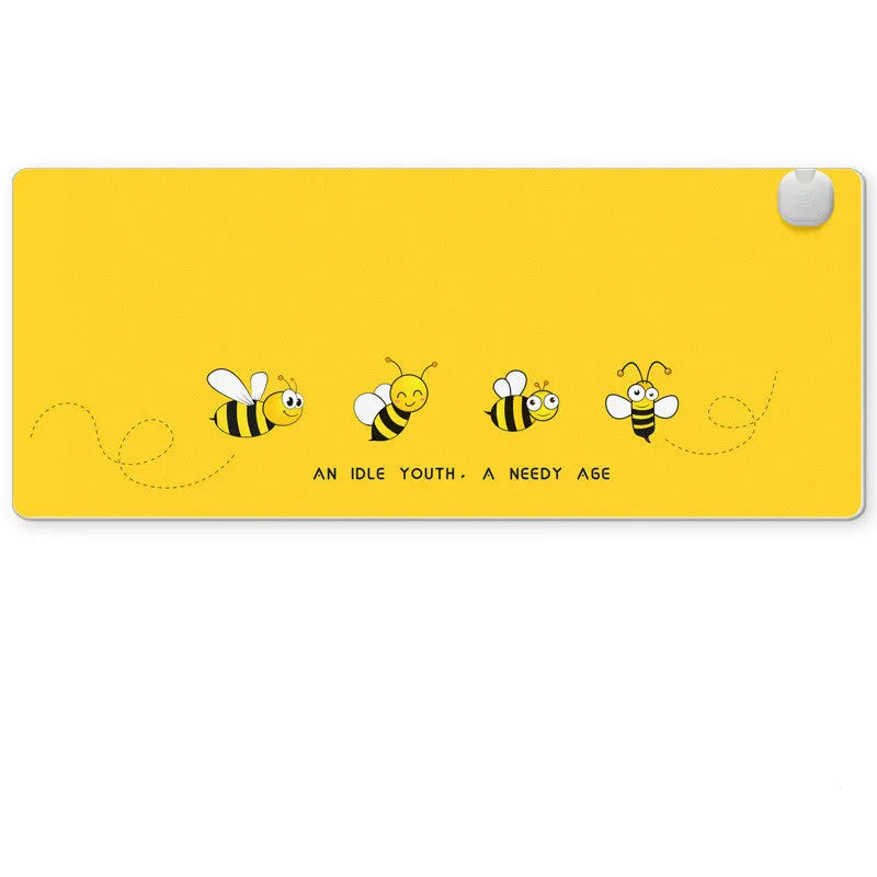 Intelligent electric heated desktop mat with touch controls and three-colour indicator lights on a wooden desk.