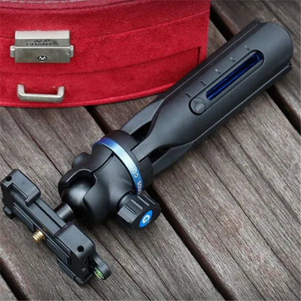 Black desktop phone tripod made of aluminium alloy and plastic, holding a smartphone.
