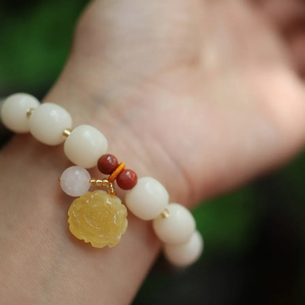 Woven gradient white jade Bodhi bracelet with beeswax lotus charm, 10mm beads, retro flower design