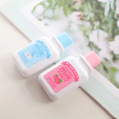 Cute bottle-shaped correction tape dispenser with decorative pattern showing 6m smooth adhesive tape.