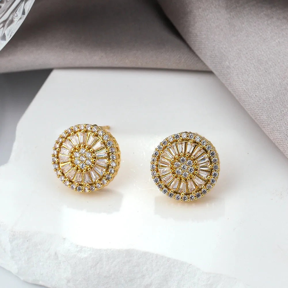 Round geometric copper earrings with electroplated gold finish and pattern design
