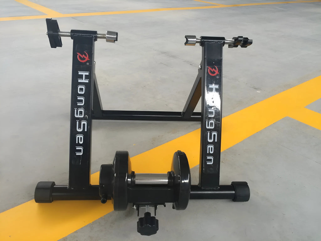 Black magnetoresistance indoor cycling training table with parking frame for 66-69CM wheel bikes