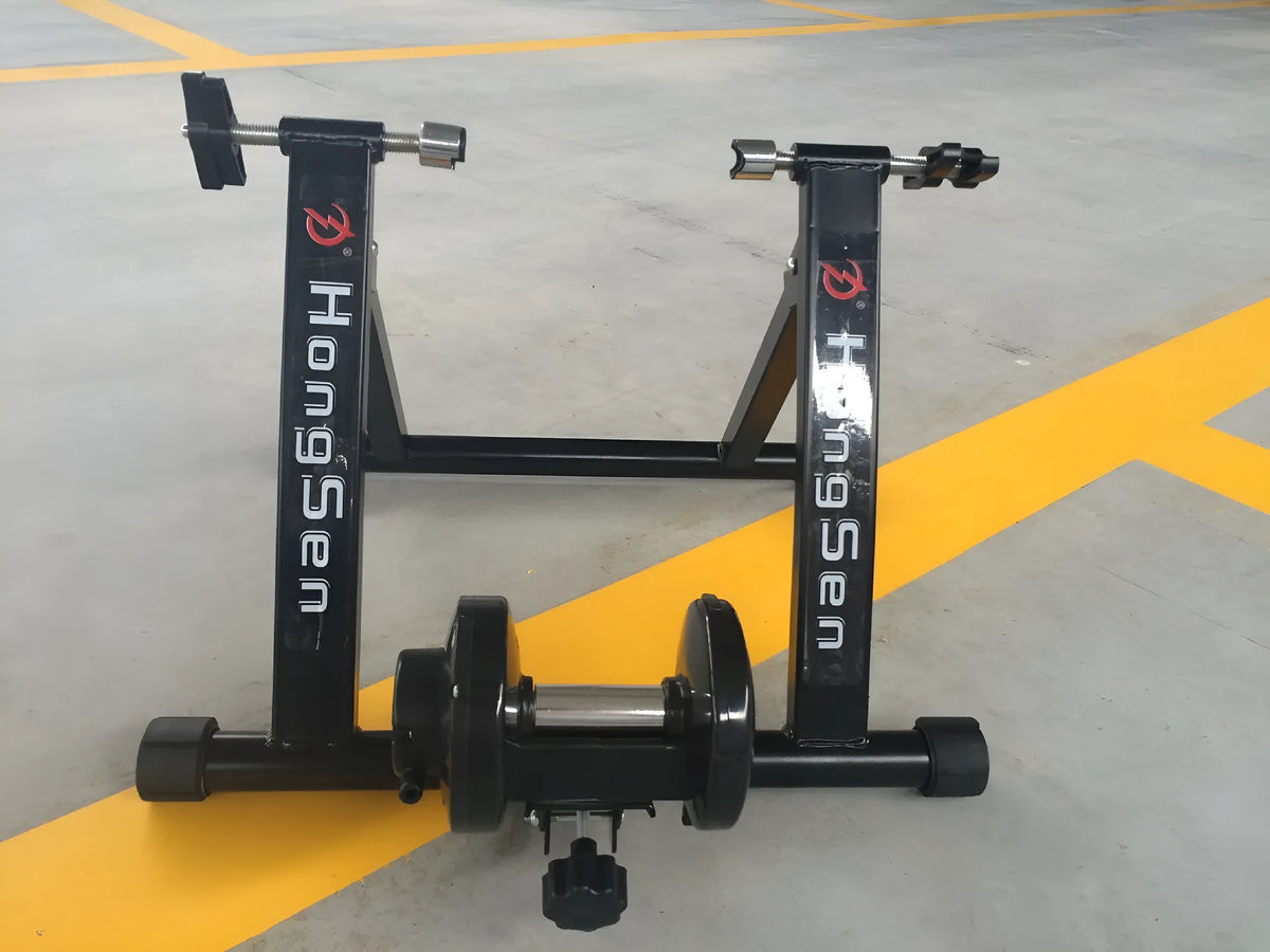 Black magnetoresistance indoor cycling training table with parking frame for 66-69CM wheel bikes