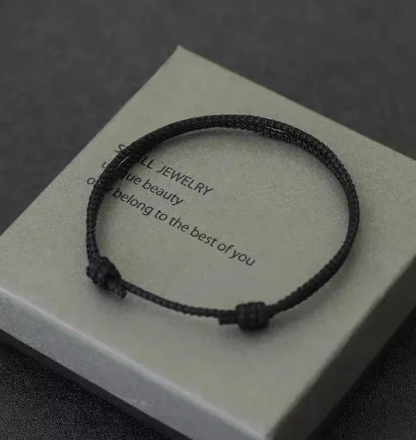 Handmade unisex adjustable string bracelet in yellow, red, or black with flexible wire and national style