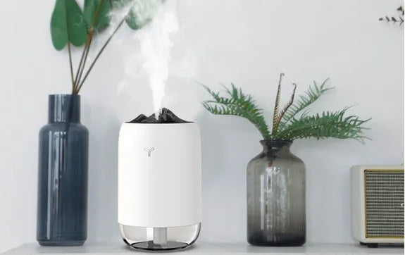 Mini cylindrical USB humidifier with 260ml water tank in green, pink or white colour options