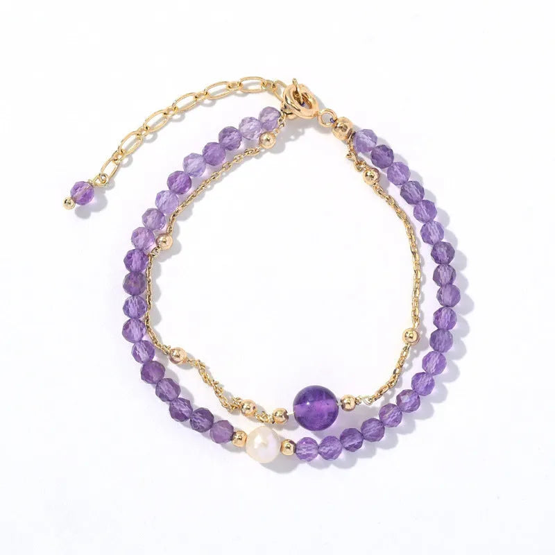 Amethyst-coloured Chinese-style women's crystal bracelet with electroplated finish and diamond shape.