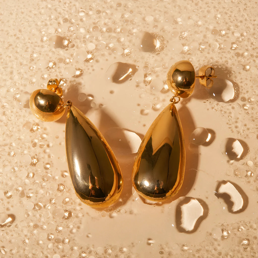 Gold electroplated stainless steel hemisphere earrings with water drop pendant design for women