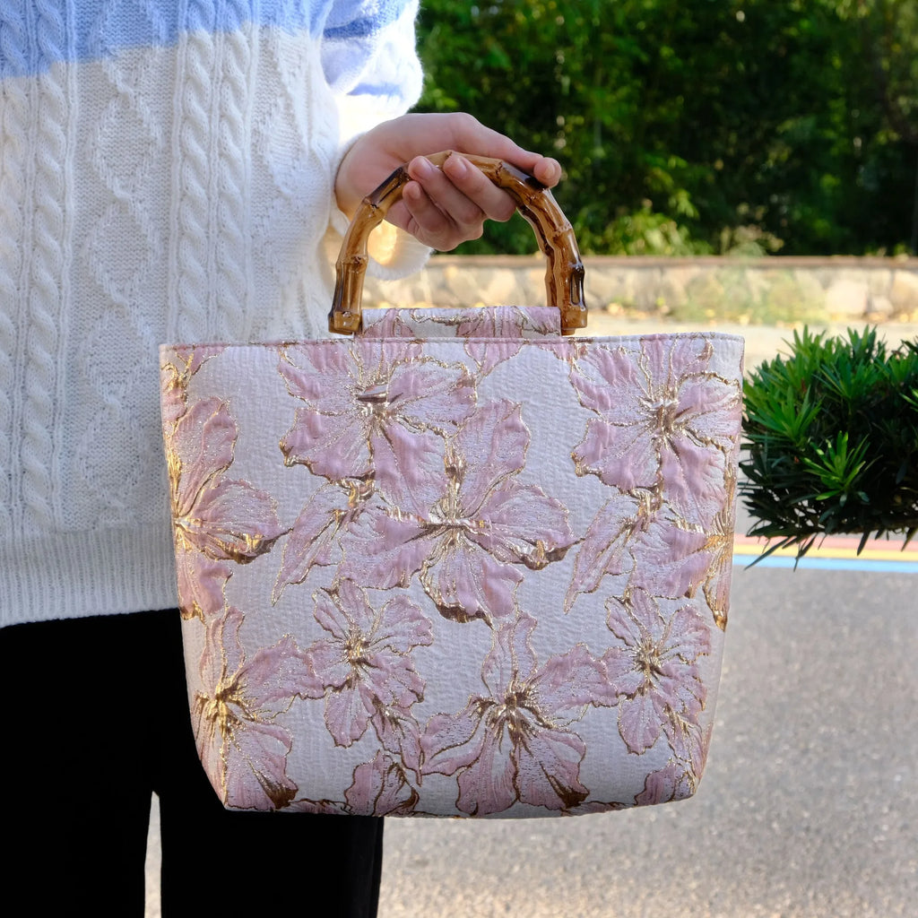 Light blue square canvas shoulder bag with gold bronzing flower pattern and double straps