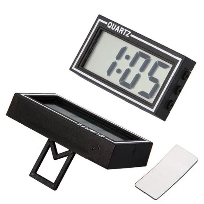 Battery-powered car clock with plastic case and ordinary glass mirror on a dashboard