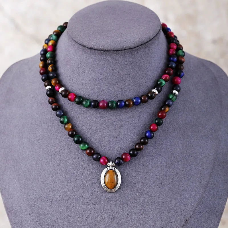 Natural stone meditation necklace bracelet with 108 pendants showing colour tiger-eye beads and mixed gem charms