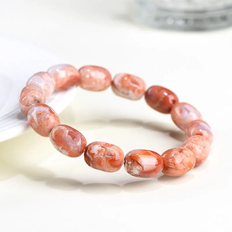 Natural cherry blossom colour agate barrel bead bracelet with Ruyi design elements
